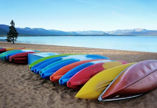 Kayaks and canoes on beach