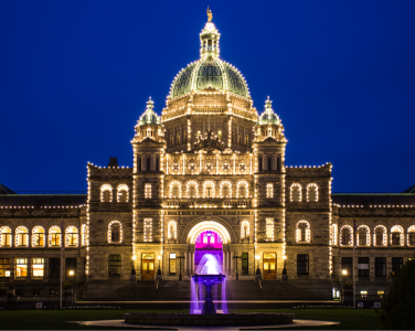 Victoria's Parliament Buildings lit up at night.