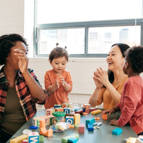 a group of parents and children playing 