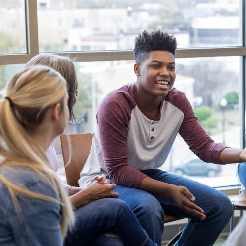 youth in a discussion circle 