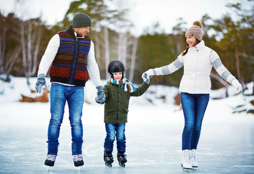 Family in outdoor rink