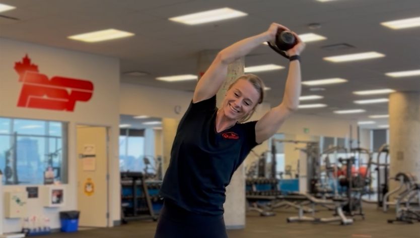 Fitness instructor performing core exercises