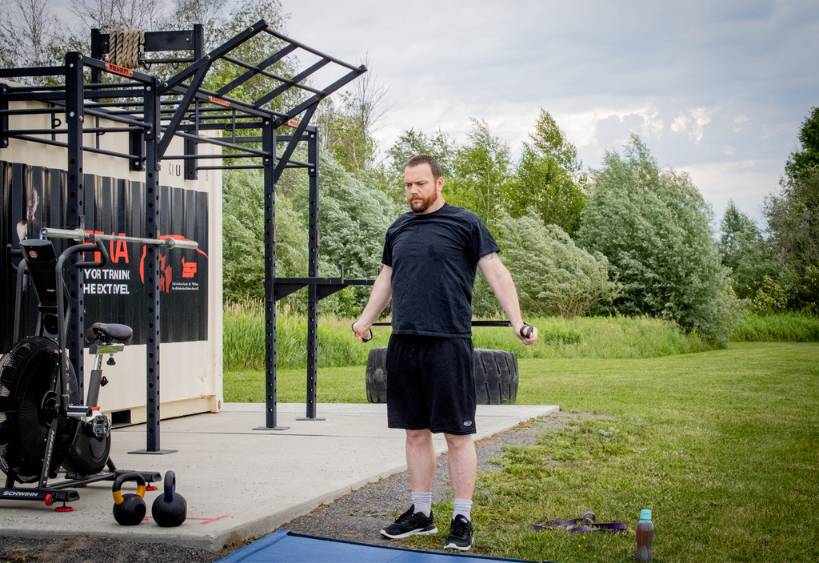 Man working out in an outdoor fitness center