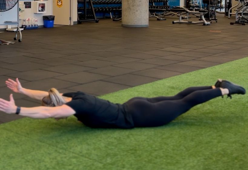 Fitness instructor doing exercise