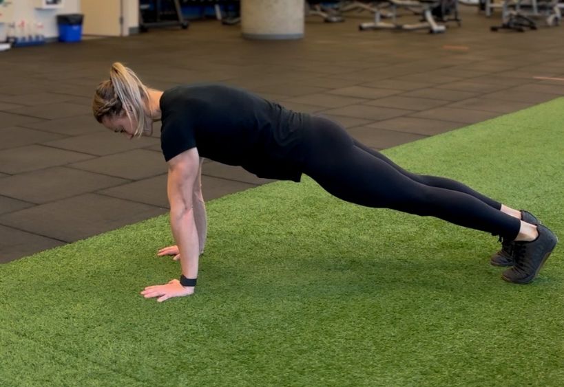 Fitness instructor doing exercise