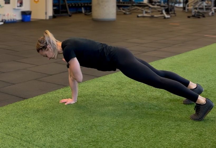 Fitness instructor doing exercise
