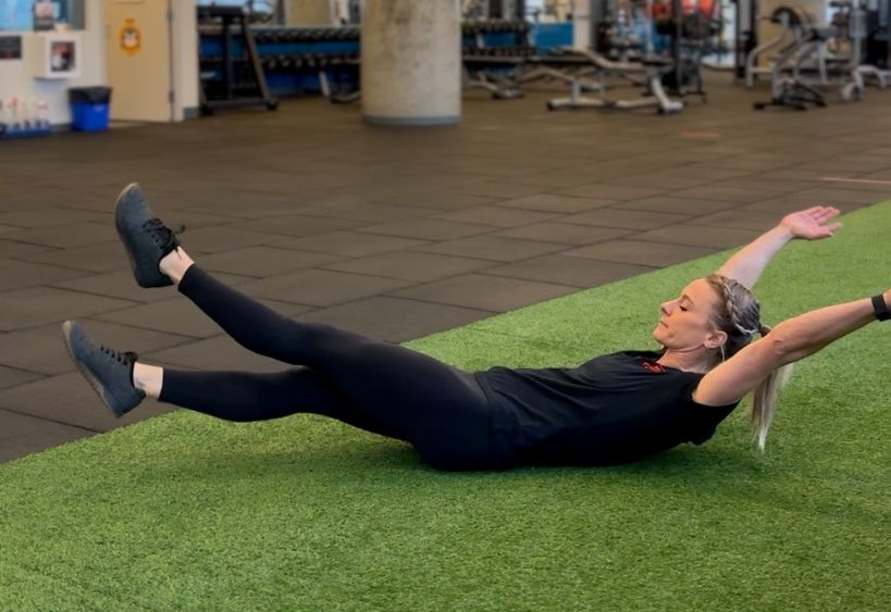 Fitness instructor doing exercise