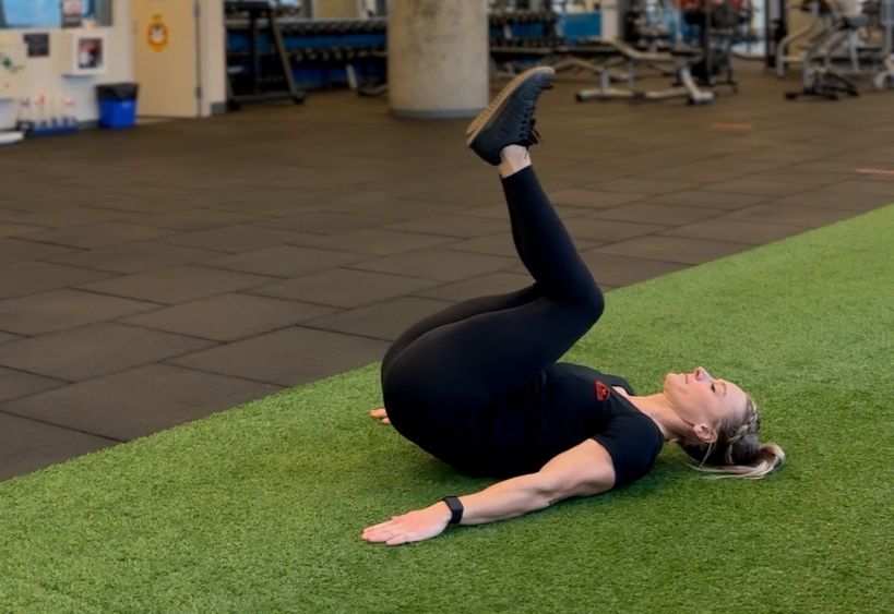 Fitness instructor doing exercise