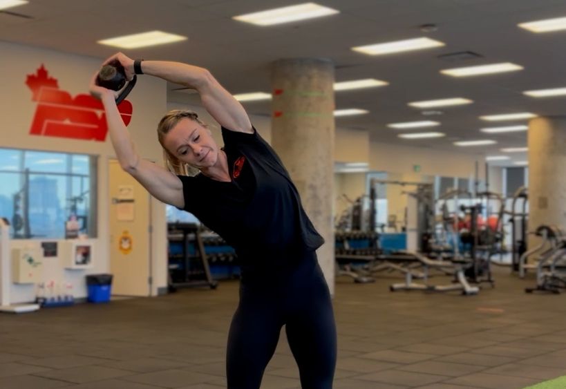 Fitness instructor doing exercise