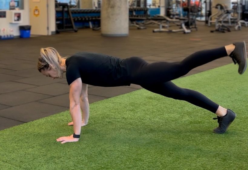 Fitness instructor doing exercise