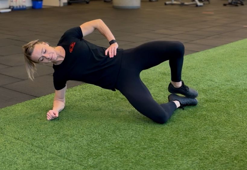 Fitness instructor doing exercise
