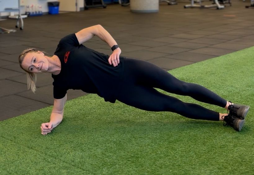 Fitness instructor doing exercise