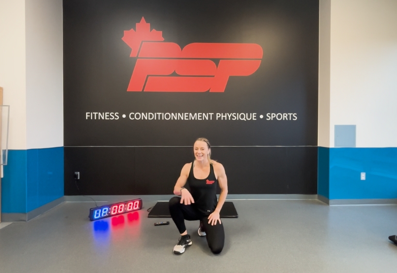 Fitness instructor doing exercise