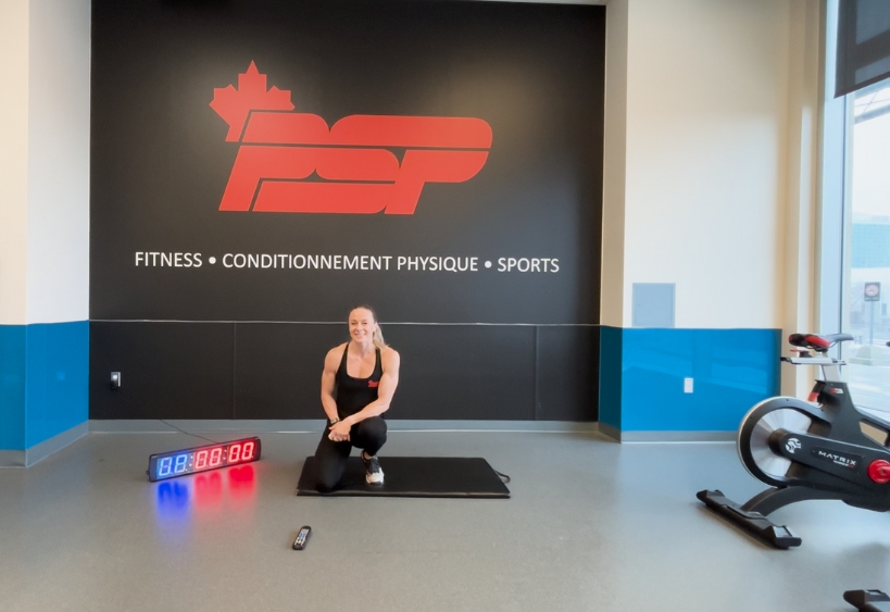 Fitness instructor doing exercise