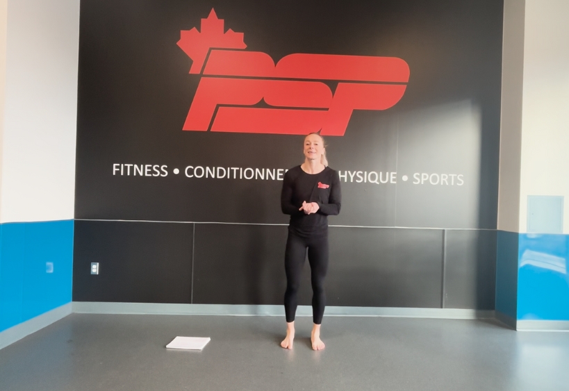 Fitness instructor doing exercise