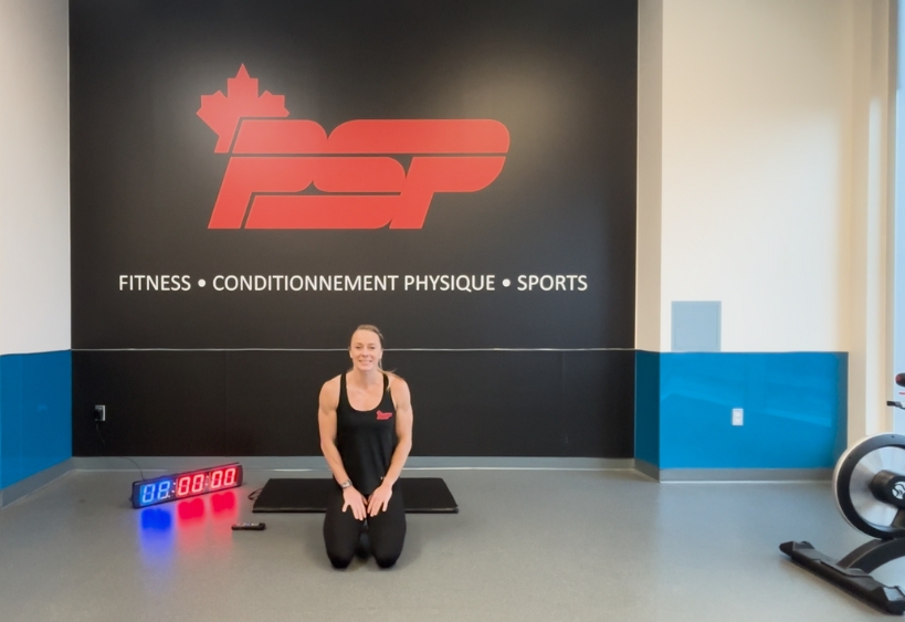 Fitness instructor doing exercise