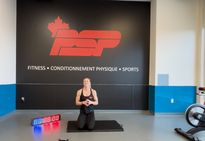 Fitness instructor doing exercise