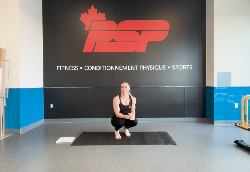 Fitness instructor doing exercise