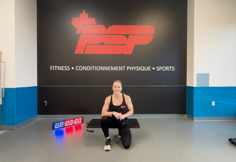 Fitness instructor doing exercise