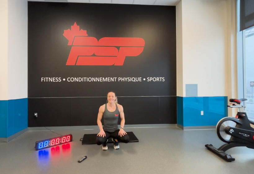 Fitness instructor doing exercise