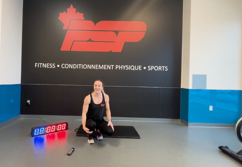 Fitness instructor doing exercise