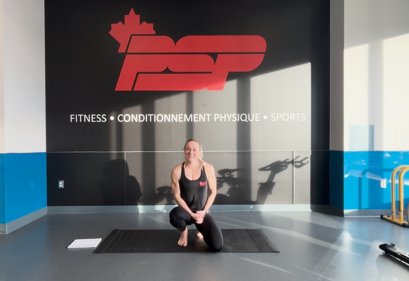 Fitness instructor doing exercise