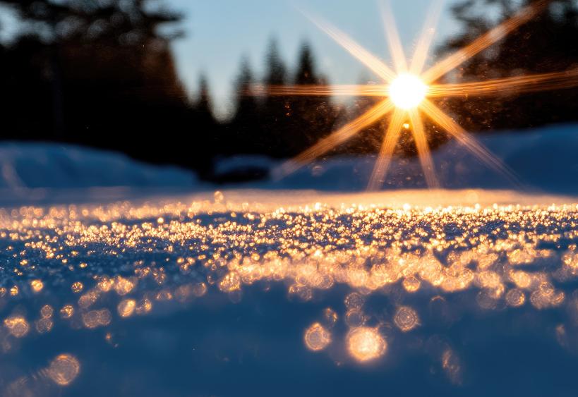 Sun setting, snow sparkling