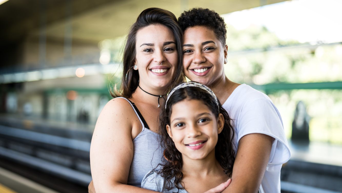 smiling couple with child