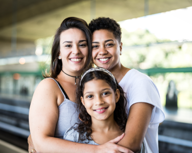smiling couple with child