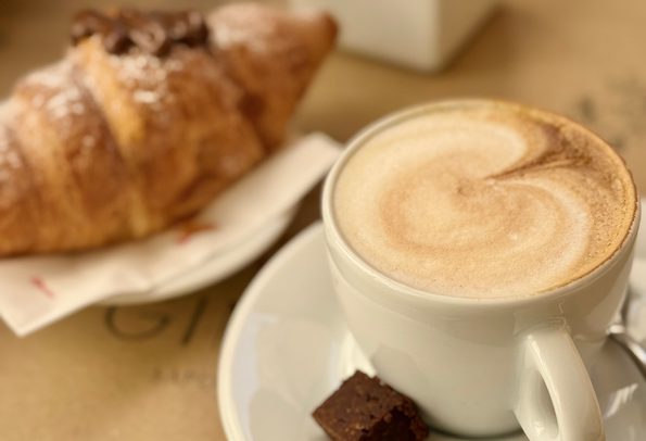 cup of coffee and a pastry
