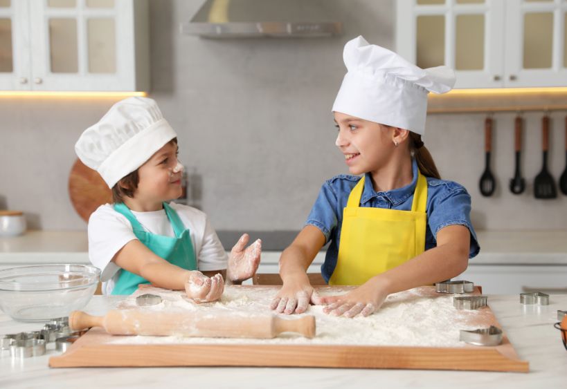 Kids cooking in a kitchen