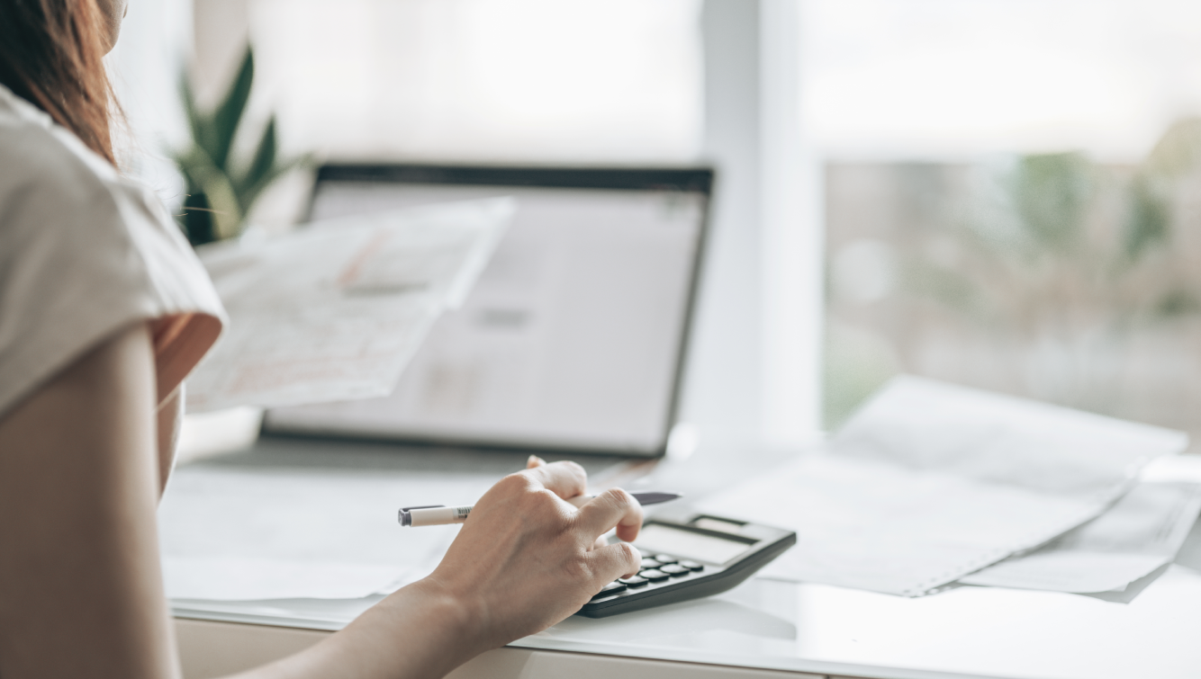 woman working on calculator