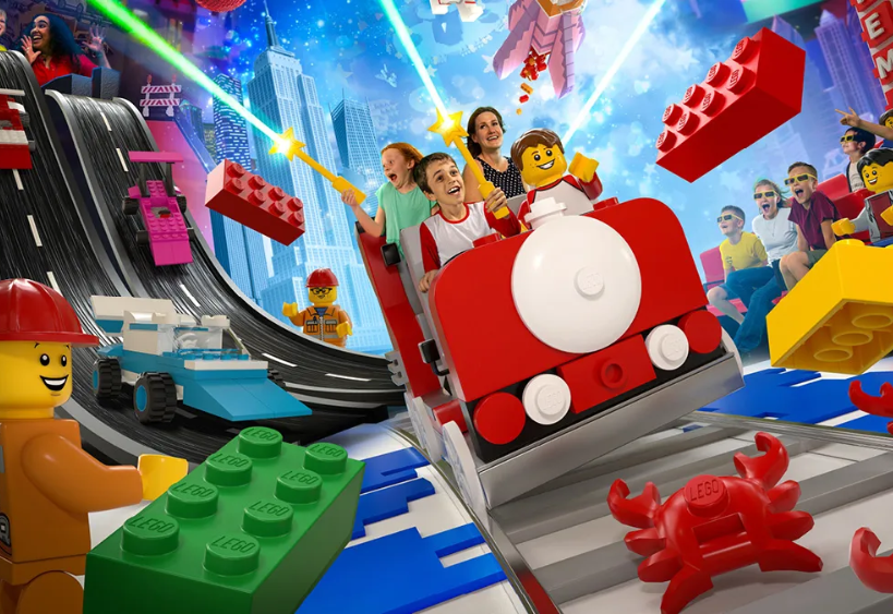 Kids are riding a Lego wagon.