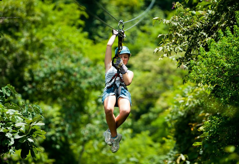 A woman ziplining