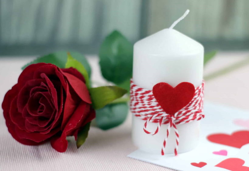 Homemade candle and rose