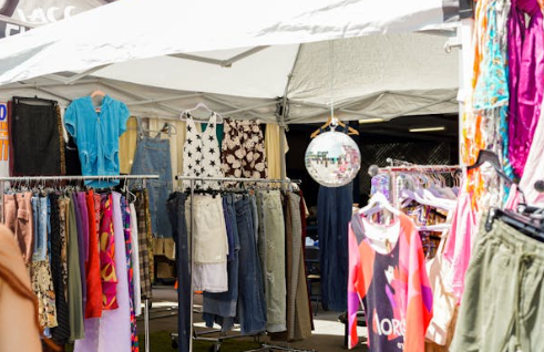 Clothing displayed at a flea market