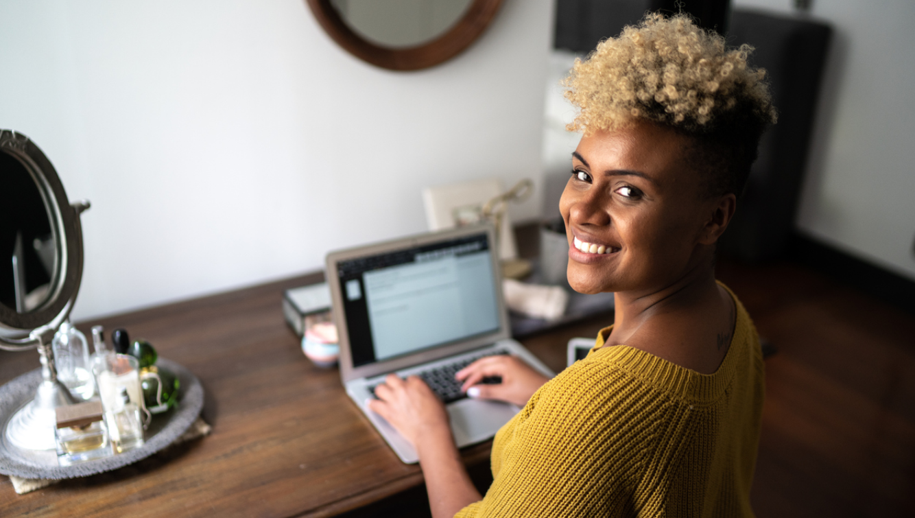 woman sitting at a laptop