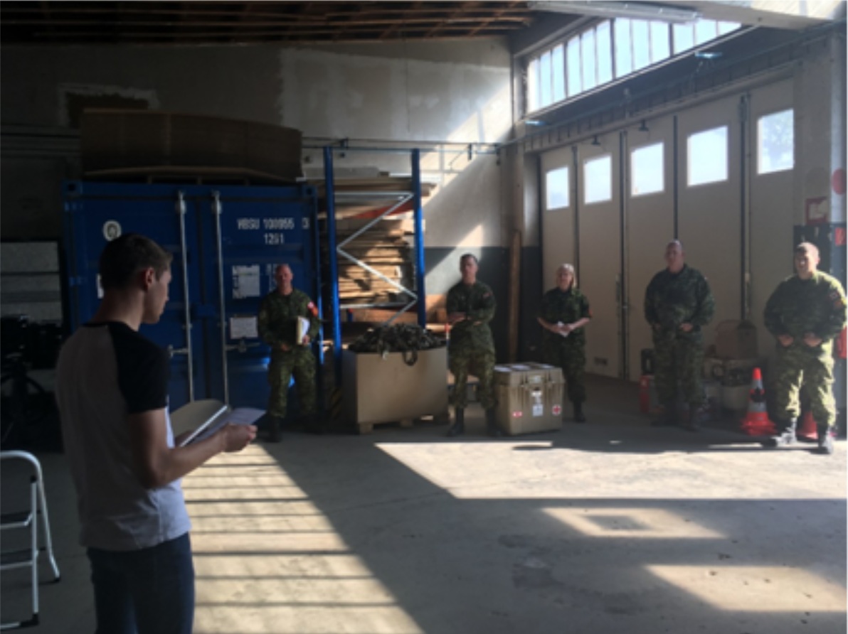 Sean May, instructs members of OSH(E) on ladder safety during one of the Hubs weekly safety briefings