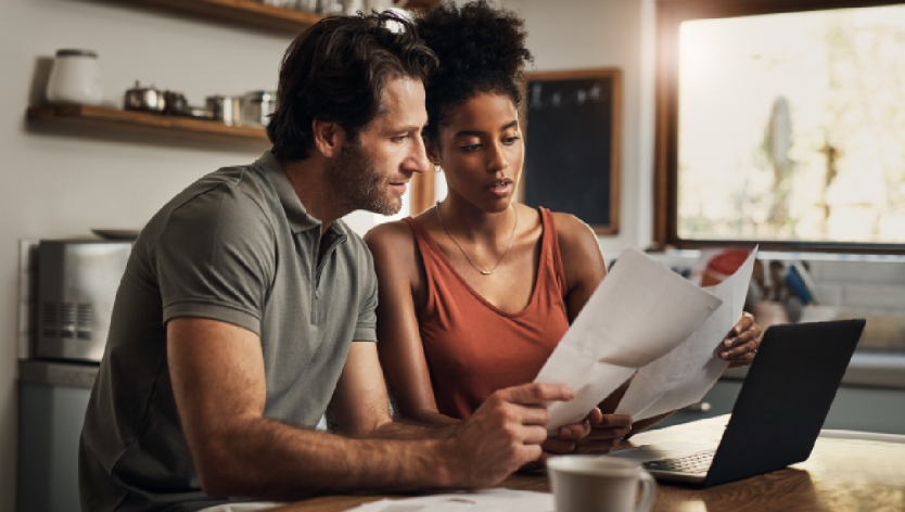 couple looking over paperwork