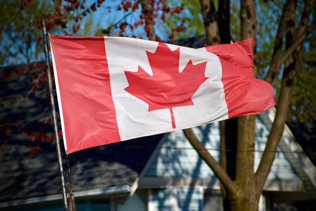 Canadian Flag Waving in the Breeze Outdoors