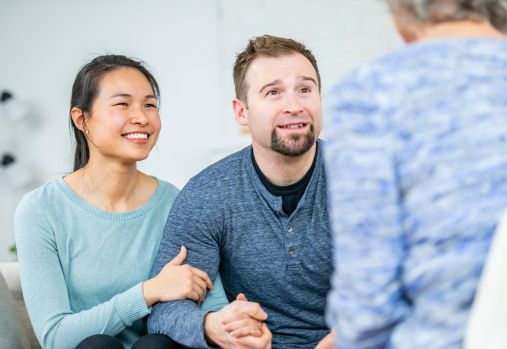 man and woman in therapy