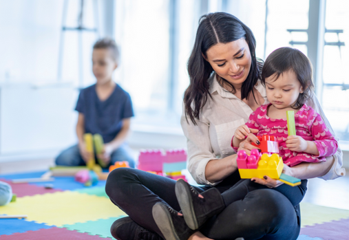 Woman and child playing