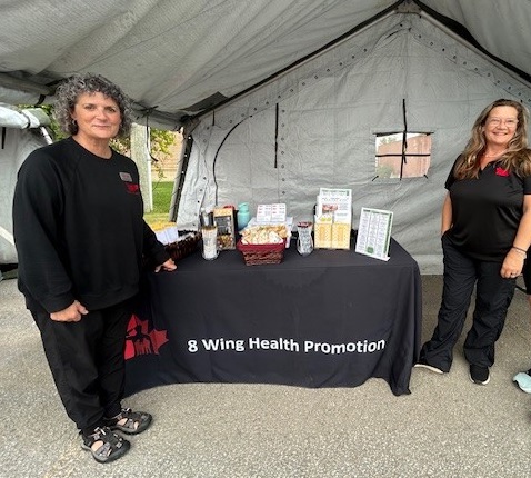 2 XHP staff at HP Booth