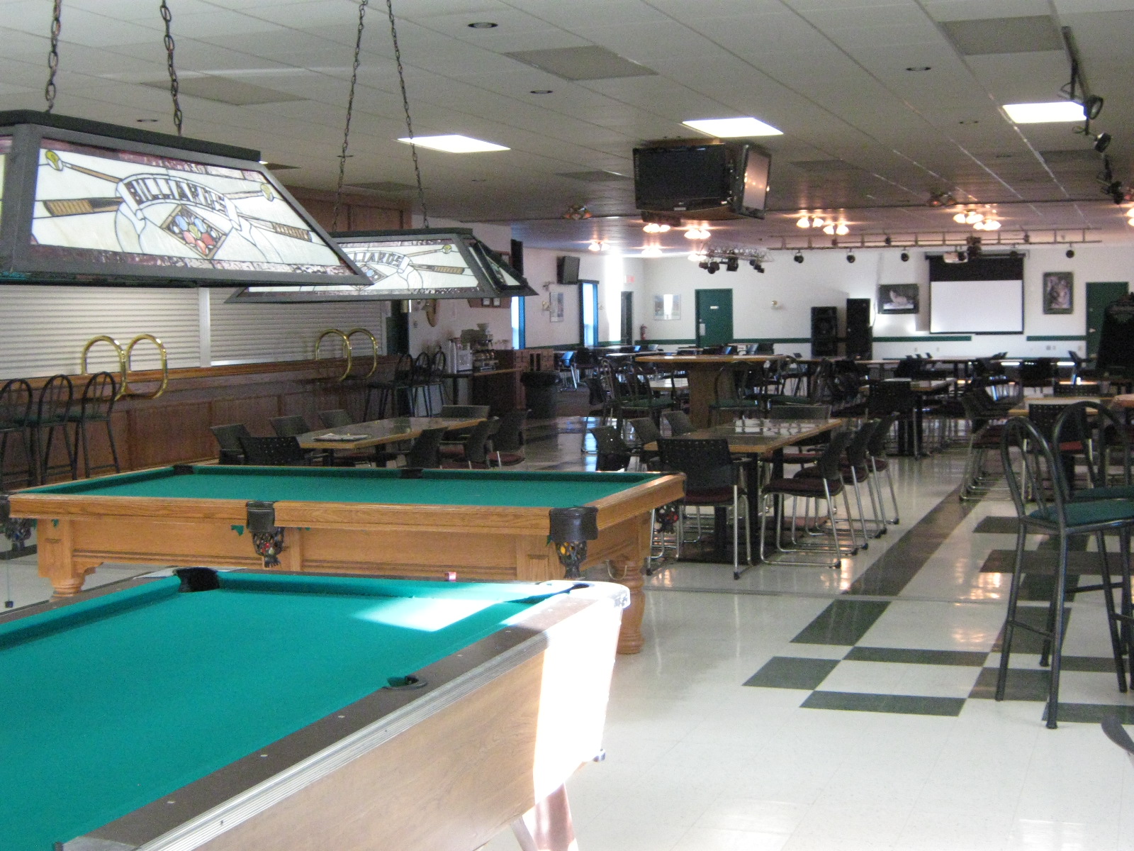Pool tables and seating inside the Junior Ranks Mess.