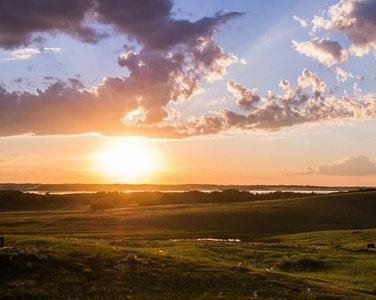 Sunset over hill top