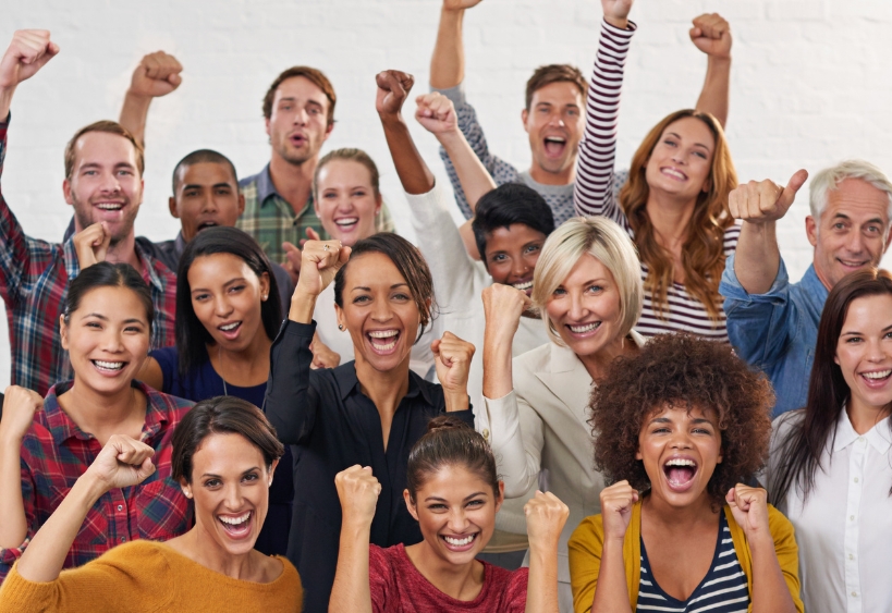 A group of people cheering for something