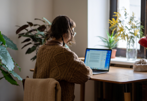 Woman looking at a computer