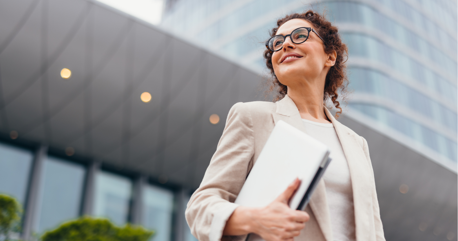 Woman holding a computer