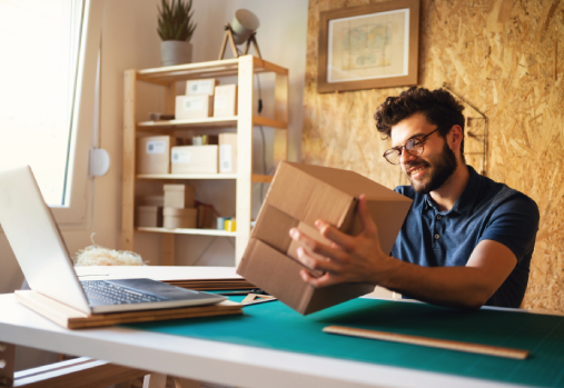 A man holding a paper box