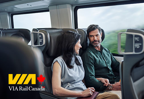 couple on the train, VIA logo